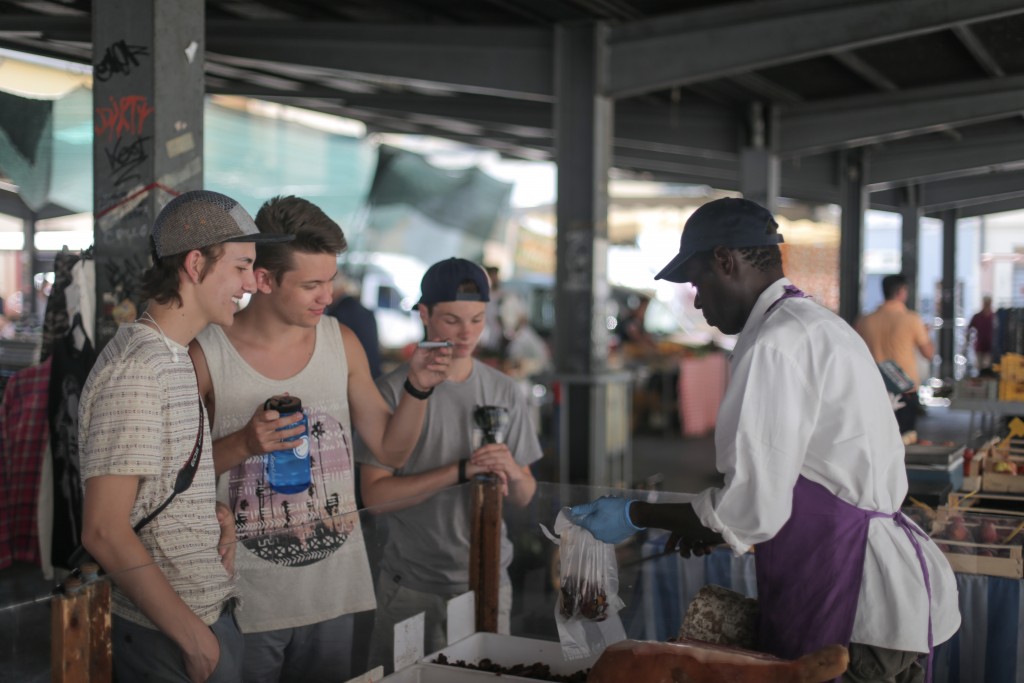 Jake, Jonah, and Maxwell haggling for sun dried tomoatoes
