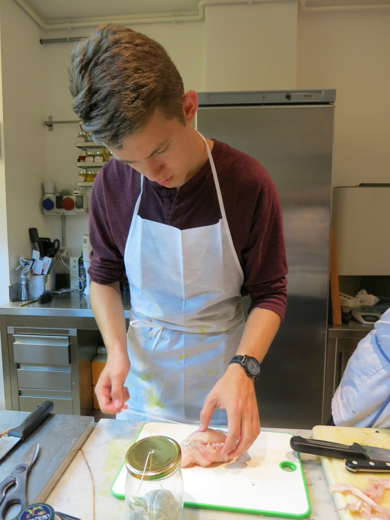 Jonah stuffing the chicken