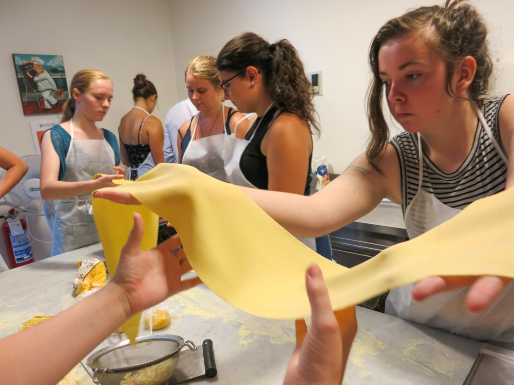 Teamwork takes its course at the pasta rolling station